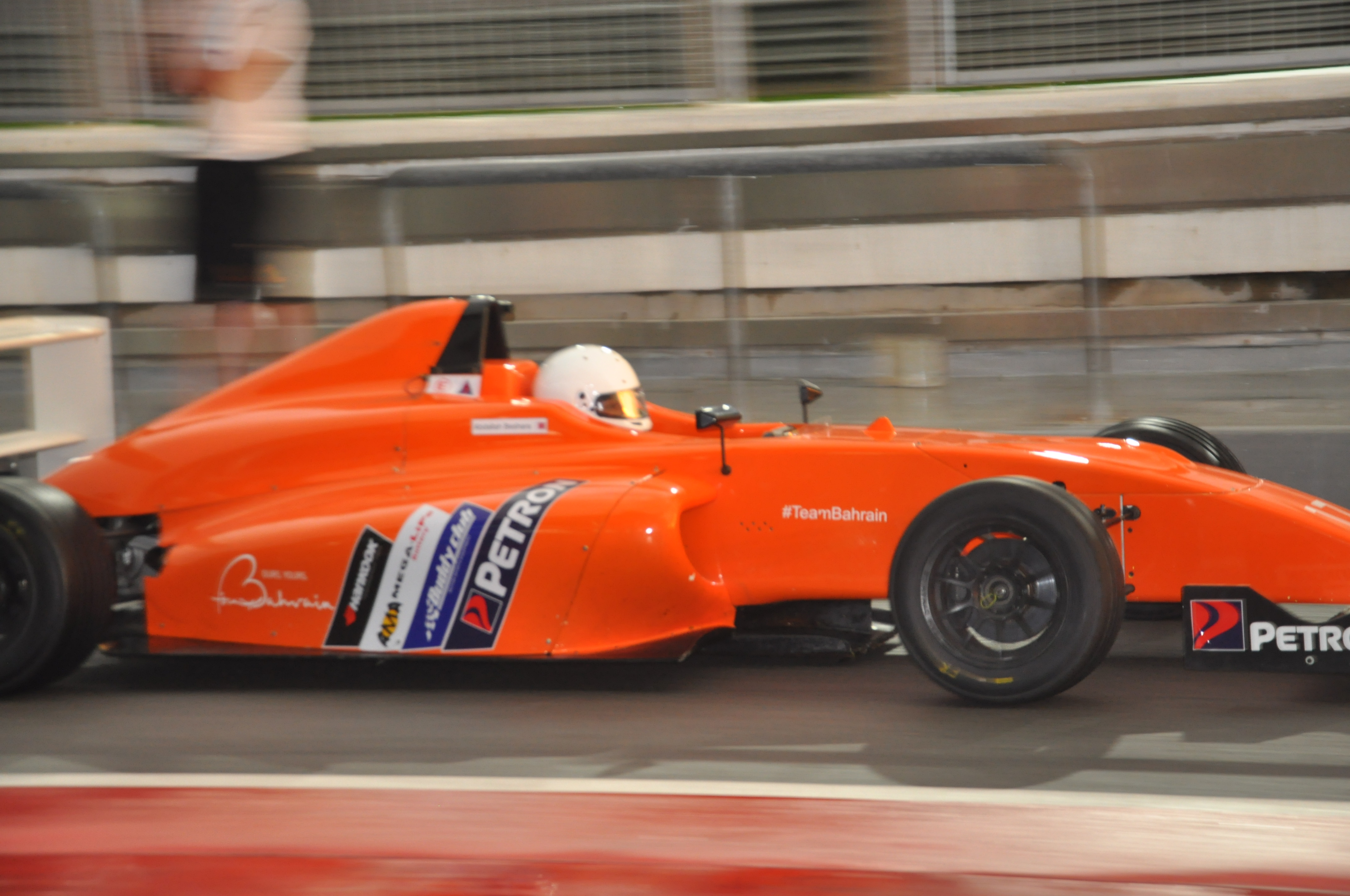 Orange car panning shot